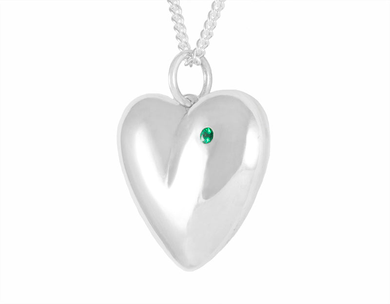 Very large solid sterling heart pendant set with tsavorite garnet.