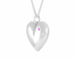 Sterling heart set with pink sapphire.