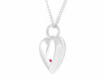 Sterling heart pendant set with a natural ruby.