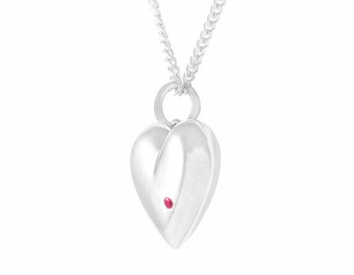 Sterling heart pendant set with a natural ruby.