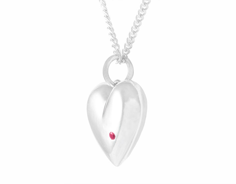 Sterling heart pendant set with a natural ruby.