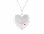 Sterling heart pendant set with a natural ruby.