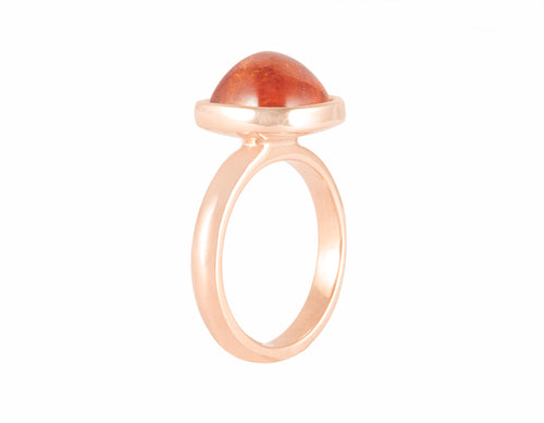 18k rose gold ring with spessartite garnet cabochon.