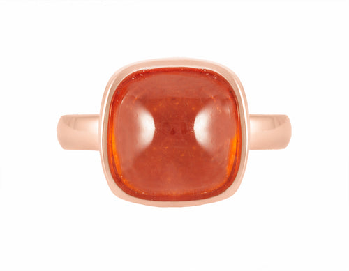 18k rose gold ring with spessartite garnet cabochon.