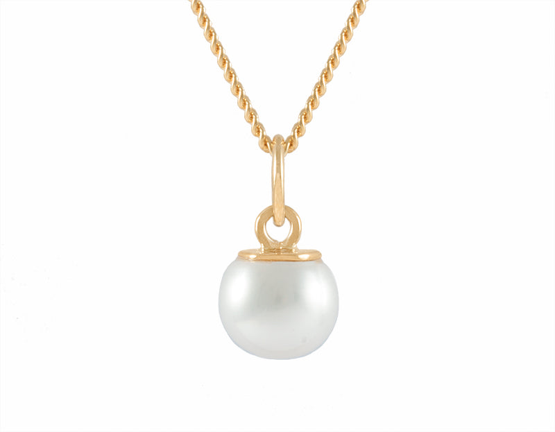 Delicate pearl pendant 18k yellow gold.