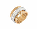 Solid 18k yellow gold band with platinum tumbler set with fine diamonds.