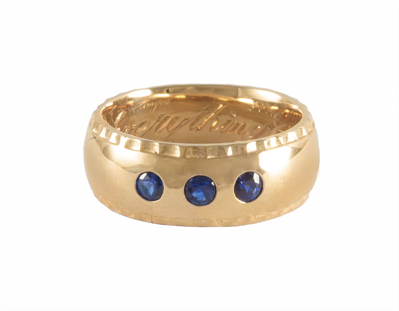 solid 14k gold man's band with sapphires and diamonds