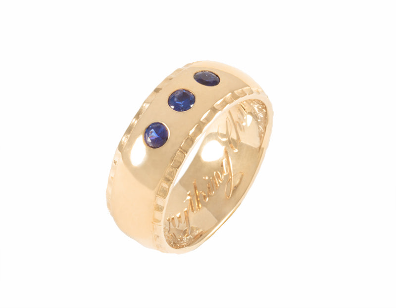 solid 14k gold man's band with sapphires and diamonds